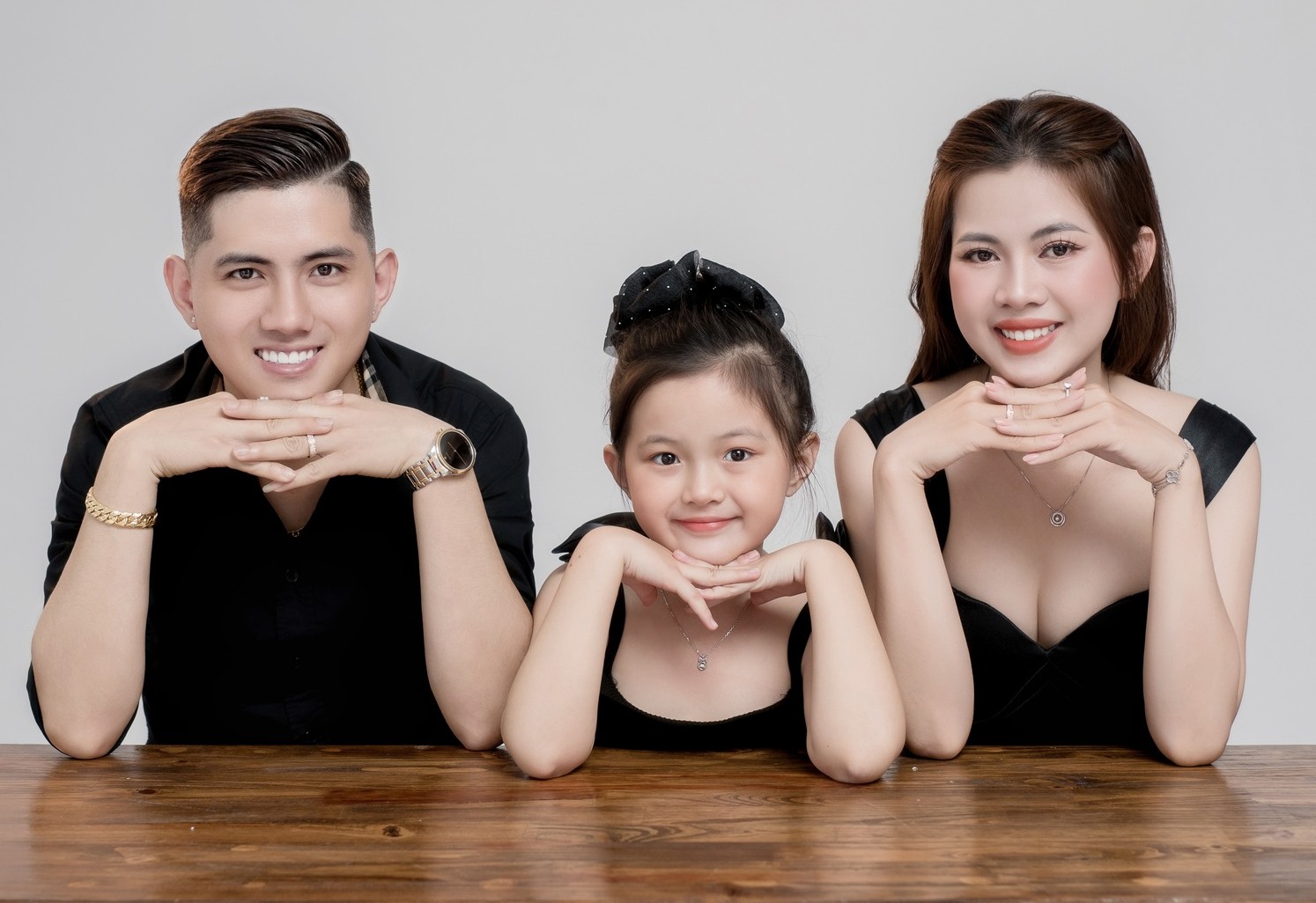 Chụp ảnh em bé và gia đình